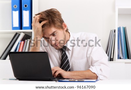 business man working problem using laptop looking at screen, hold head hand pain, ache, businessman tired, overworked sitting at the desk stress, at office, computer error concept