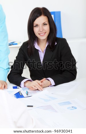 young businesswoman happy smile sitting at the desk in office, during meeting with colleagues, business woman work with business plan, papers charts, document