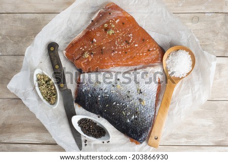 Smoked marinated salmon and ingredients on the kitchen table