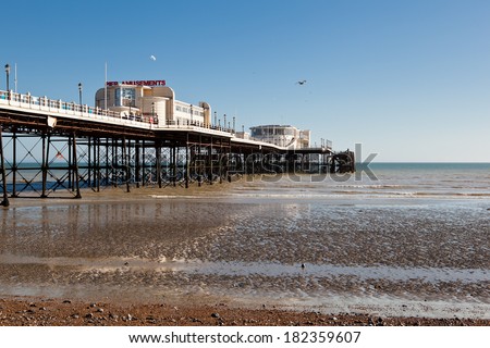WORTHING, ENGLAND - MARCH 17. People on Worthing pier, West Sussex, England on March 17, 2014