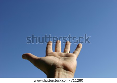 Hand palm up toward sky