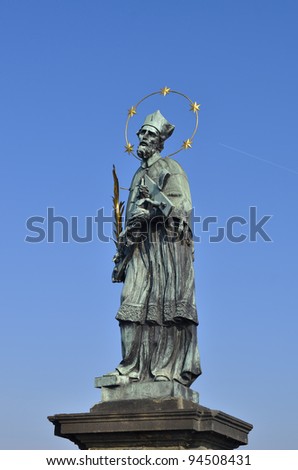 Holy stone figure at Charles bridge Prague, Czech Republic
