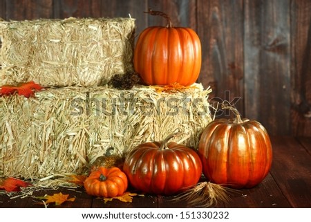 Pumpkin Jack O Lantern on Wood Grunge Rustic Background