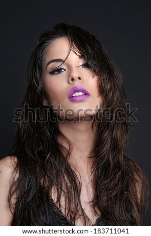 Sexy Young Woman on a Simple Background