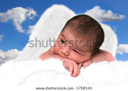 Infant Baby Girl in Clouds With Fantasy Butterfly Wings