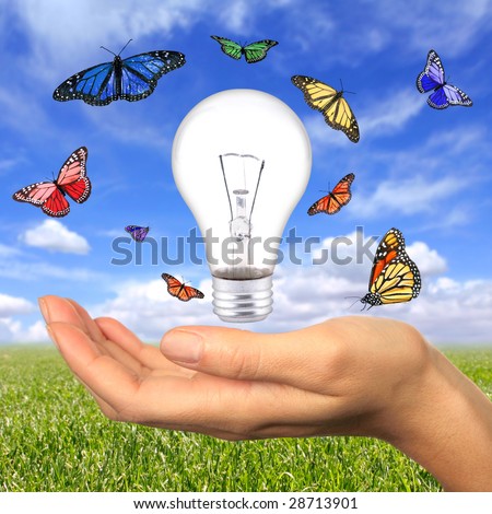 Woman Holding Lighbulb Concept of Clean Renewable Energy of the Future