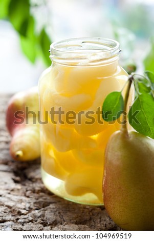 Canned pear compote in jar