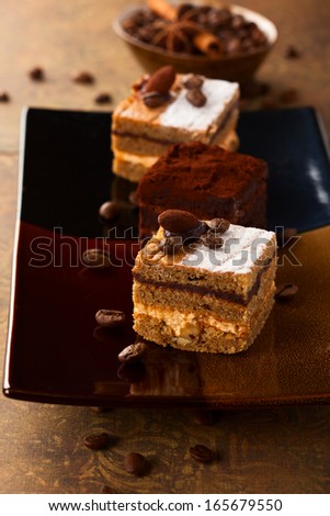 Coffee cream  small cakes and chocolate truffle cakes