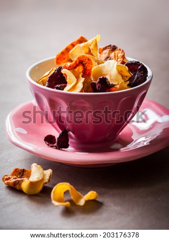 Assorted vegetable crisps in a bowl