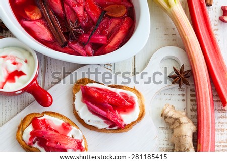 Toasted bread with yogurt and top with syrupy spiced rhubarb