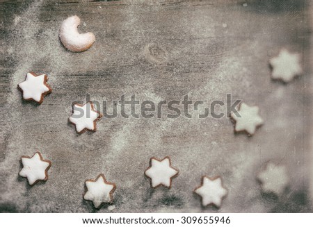 Christmas background with gingerbread cookies in vintage style. Old film grain effect.
