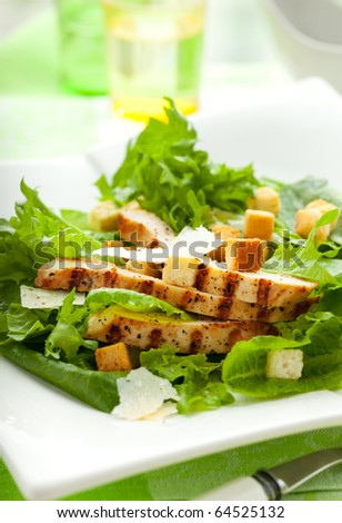 Chicken Caesar salad  on the white plate