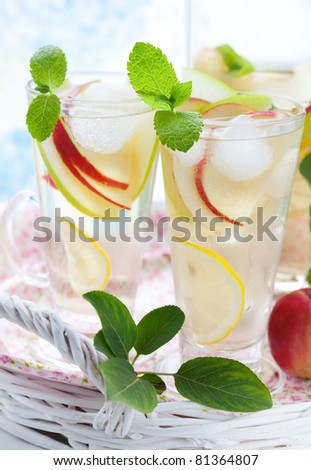 Apple drink with lemon,mint and ice cubes