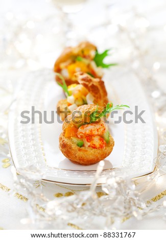 Prawn salad with egg and avocado in mini-brioche for holiday