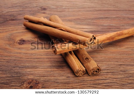 Sticks of cinnamon on the board