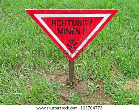 ahtung minen as text on german language, danger red sign warning \