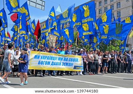 KIEV - MAY 18: Political meeting on May 18, 2013 in Kiev, Ukraine. Representatives of Svoboda (Freedom) party on the street. About 50000 people take part in the event in Kiev.