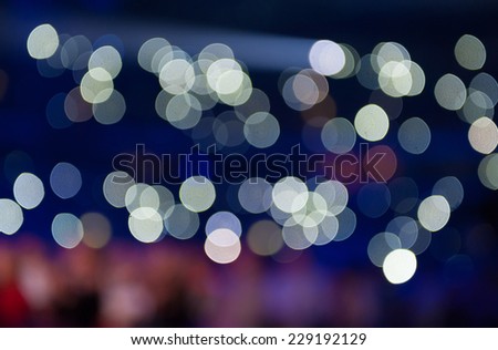 De-focused lights on a blue background.Defocused light spots on a blue background.