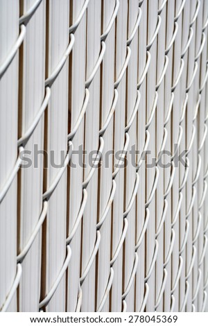 Chain Link fence with privacy slats\
Linked Fence\
Winged Slats for Chain Link Fences\
Metallic Fence
