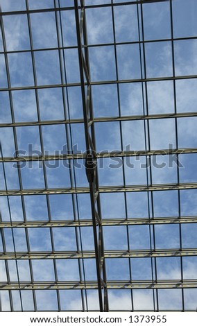 blue skies through windows of business center