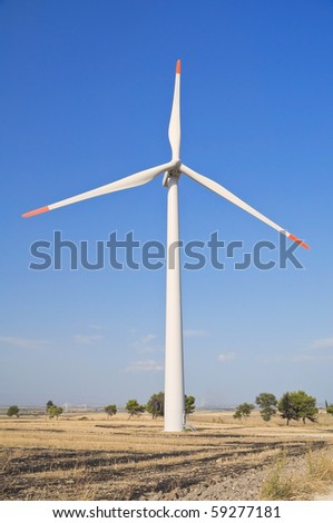 Wind turbine blades in countryside.