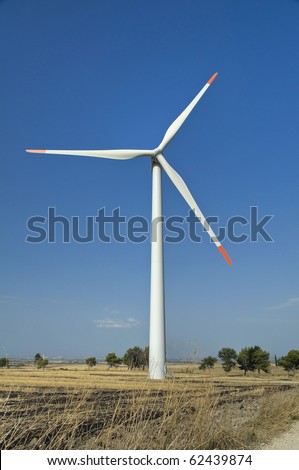 Wind turbine blades in countryside.
