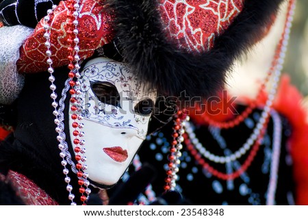 VENICE - FEBRUARY 11: A masked person participates in the Carnival on February 11, 2007 in Venice. The Carnival traditionally celebrates the passing of winter, with parties, costumes and balls.