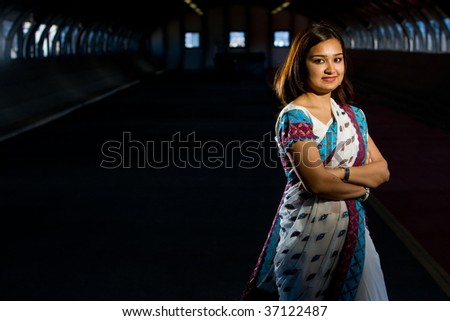 Attractive indian lady in traditional costume saree celebrating deewali religious festival of india