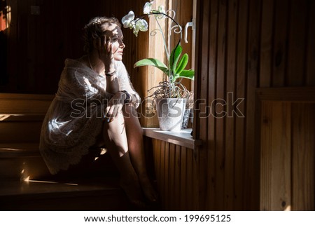 Girl looking out the window and misses