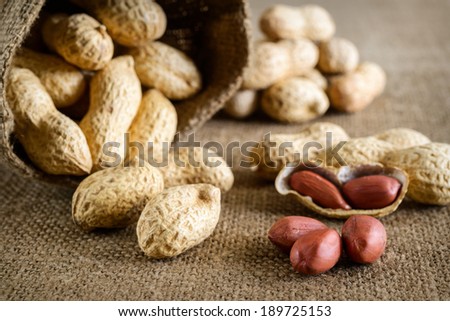 Peeled peanut on well peanuts