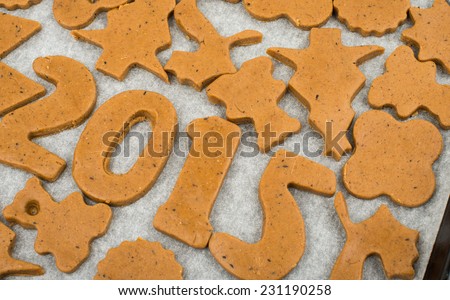 Gingerbread dough for Christmas cookies on a white background