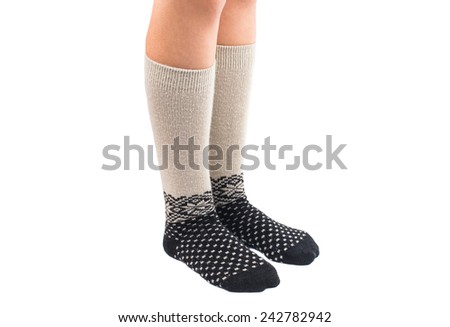 long socks on his feet on a white background