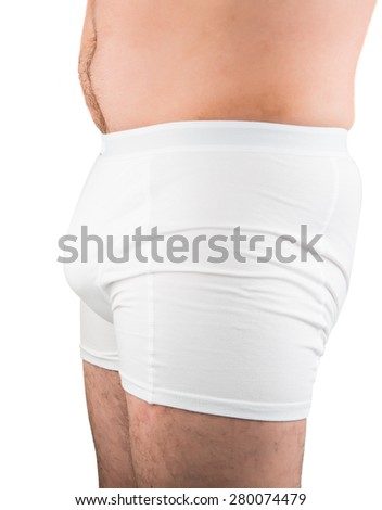 close up of man on white boxer underwear pointing at penis isolate on white background