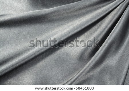 Background of black shiny silk , close up