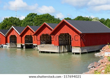 Red boat houses. Finland