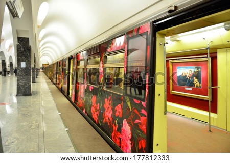 MOSCOW,RUSSIA - FEBRUARY 20:Aquarelle Train is wheeled picture gallery.15 paintings of Sergey Andriyaka and 30 pictures of his students are represented in Aquarelle Train.Moscow Metro,February 20,2014