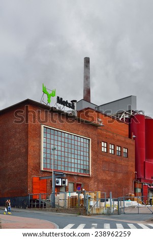 TAMPERE, FINLAND - AUGUST 28, 2014: Metsa Board Tako produces high-quality paperboard for demanding packaging. Mill is located in centre of Tampere, southern Finland.