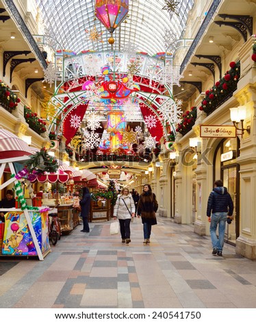 MOSCOW,RUSSIA - DEC 29,2014:GUM department store, located across Red Square, is welcoming visitors with decorations in heart of Moscow as city prepares for upcoming Christmas and New Year celebrations