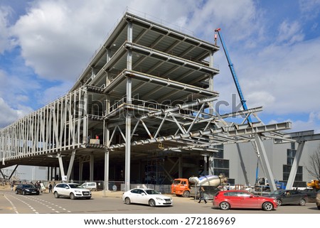 MYAKININO, RUSSIA - APRIL 18, 2015:Construction of office center and covered walkway connects metro station to shopping center Vegas Crocus City. Crocus City is in Myakinino, satellite city of Moscow