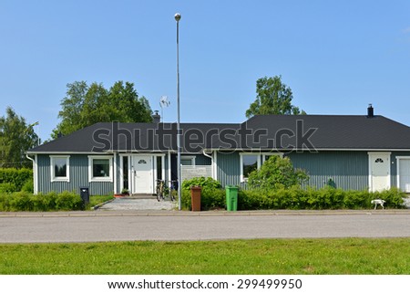 HAPARANDA,SWEDEN - JULY 11,2015:Haparanda is city in Norrbotten. It is twinned with Tornio (Finland) just across Torne river. Here are preserved old wooden houses, which are surrounded by lush gardens