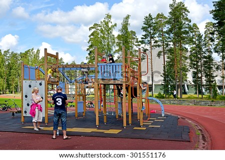 VIERUMAKI, FINLAND - JULY 18,2015:There is outdoor play area located in Verumaki. Playground has swings and other play equipment  that helps to develop motor skills, strength, and balance