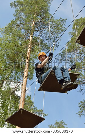 VIERUMAKI,FINLAND - JULY 18,2015:Flowpark is adventure theme park. It is targeted at people older than 6 who have adventurous streak, guaranteed to offer fun challenges to newbies and old hands alike