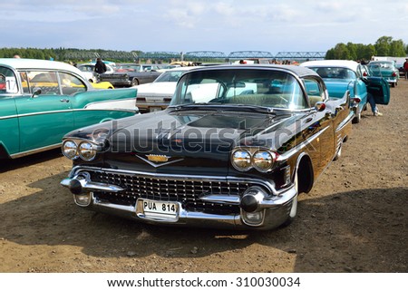 HAPARANDA, SWEDEN - JULY 11, 2015:Wheels Nationals car meet draw 30000 visitors and become bigger each year. After meeting cars long go around city that all passersby could see and photograph them