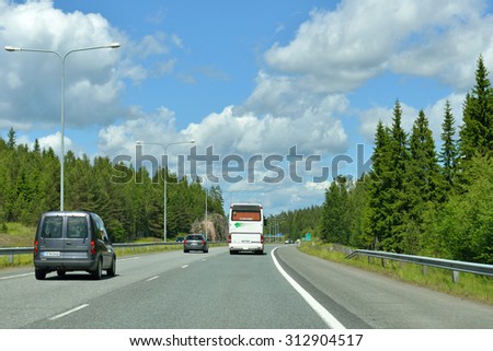 KUOPIO, FINLAND - JUNE 28, 2015: Roads in Finland comprise 78,141 km, main highways are all paved and have at least two lanes