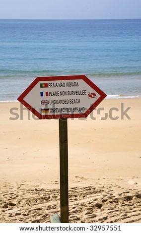 Portuguese life guard beach warning sign of Unguarded Beach