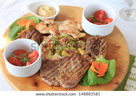 pork meat with potatoes and vegetables