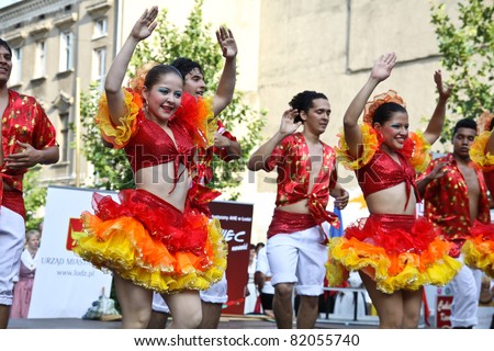 LODZ, POLAND - JULY 28: A folklore dancing group from Columbia, performs during the International Folk Festivals in Lodz, on June 28, 2011 in Lodz, Poland.