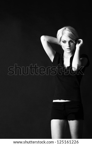 female fashion model, blond hair, black and white