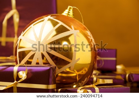 violet Christmas gift boxes and Xmas gold ball decoration