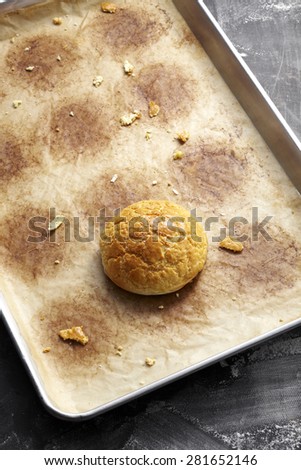 Pineapple Bread in empty plate, on the black board